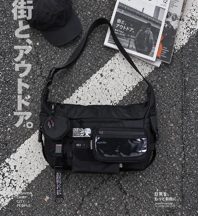 SONIXED shoulder bag photographed on asphalt