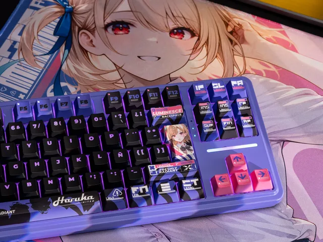 Close view of TR88H character keycap artwork, blue and black graphic keys and purple backlighting