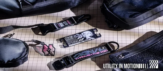 SONIXED modular carry accessories with HITM character graphics and Utility in Motion typography